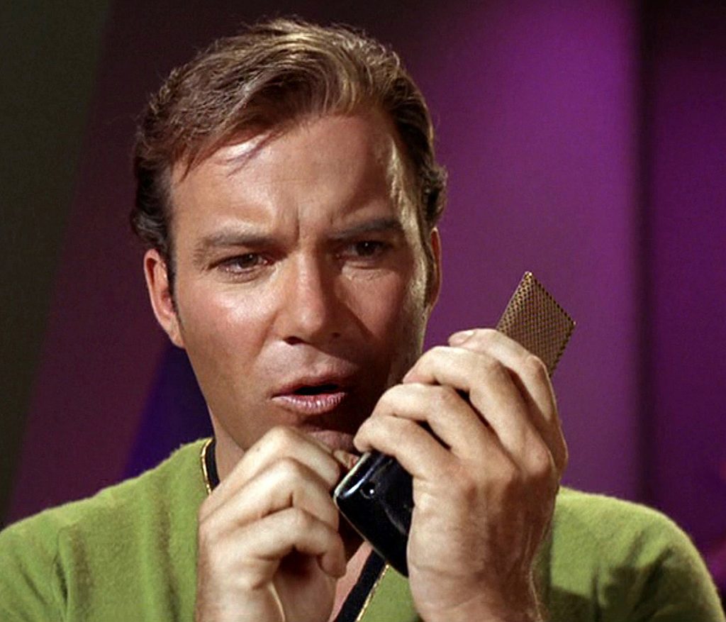 Kirk with a communicator